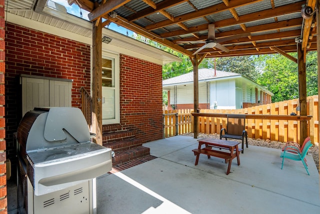 view of patio / terrace featuring fence and entry steps