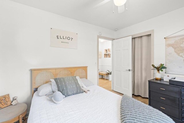 bedroom featuring ceiling fan and light wood-type flooring