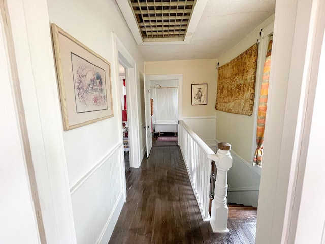 hallway with dark wood-type flooring