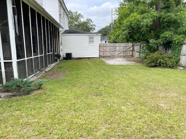 view of yard featuring a sunroom