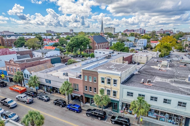 birds eye view of property featuring a city view