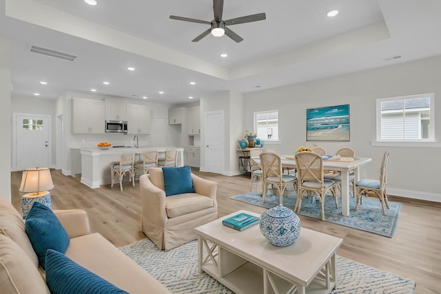 3218 Pinewood Dr, Ladson, SC 29456 - living area featuring plenty of natural light, baseboards, ceiling fan, light wood-style floors, and recessed lighting