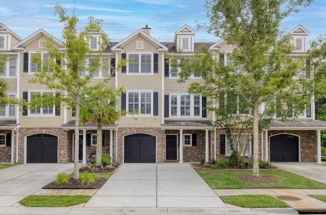 3588 Bagley Dr, Mount Pleasant, SC 29466 - multi unit property featuring driveway, brick siding, and an attached garage