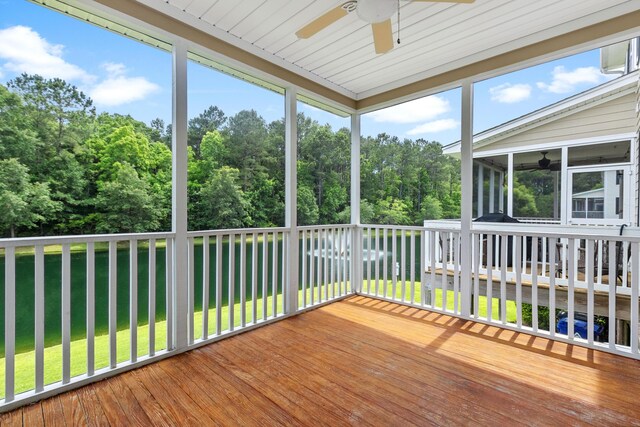 3588 Bagley Dr, Mount Pleasant, SC 29466 - unfurnished sunroom with a ceiling fan, view of scattered trees, and plenty of natural light