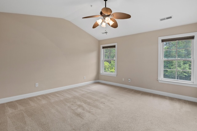3588 Bagley Dr, Mount Pleasant, SC 29466 - empty room with baseboards, vaulted ceiling, a ceiling fan, and light colored carpet