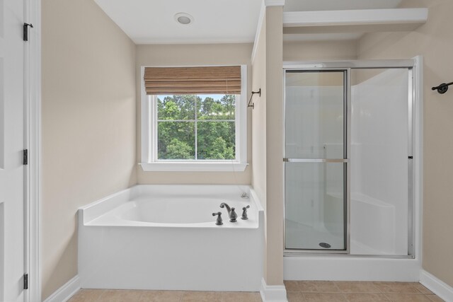 3588 Bagley Dr, Mount Pleasant, SC 29466 - full bathroom featuring a shower stall, a bath, tile patterned flooring, and baseboards