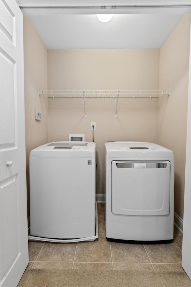 3588 Bagley Dr, Mount Pleasant, SC 29466 - washroom with separate washer and dryer and tile patterned floors