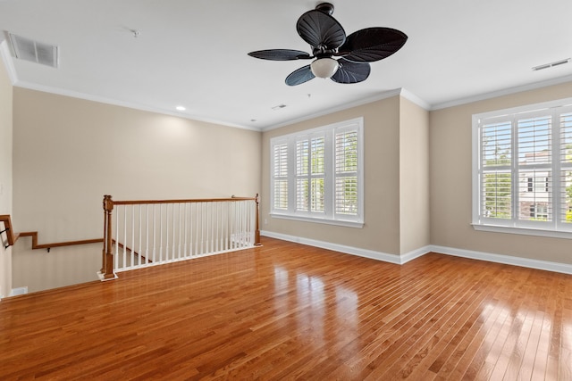 3588 Bagley Dr, Mount Pleasant, SC 29466 - spare room featuring plenty of natural light, wood finished floors, baseboards, and ornamental molding