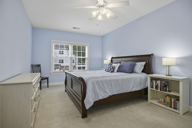 living room with light hardwood / wood-style flooring, ceiling fan, and ornamental molding