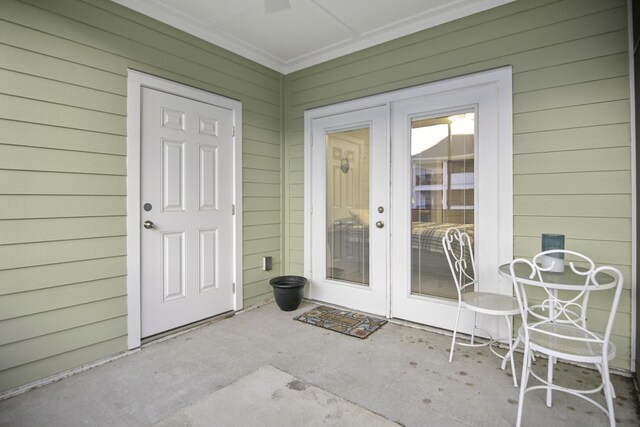 bedroom featuring ceiling fan, french doors, light colored carpet, and access to exterior