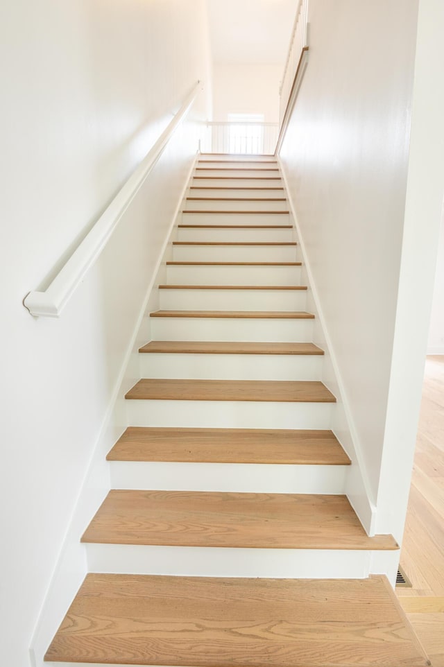 173 Coming St Unit B, Charleston, SC 29403 - stairway with wood finished floors