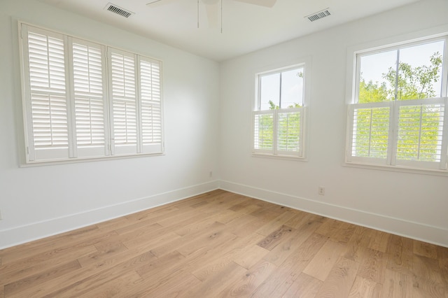 173 Coming St Unit B, Charleston, SC 29403 - spare room featuring healthy amount of natural light, light wood finished floors, and ceiling fan
