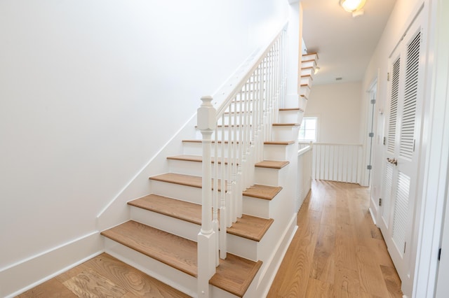 173 Coming St Unit B, Charleston, SC 29403 - stairway with wood finished floors and baseboards