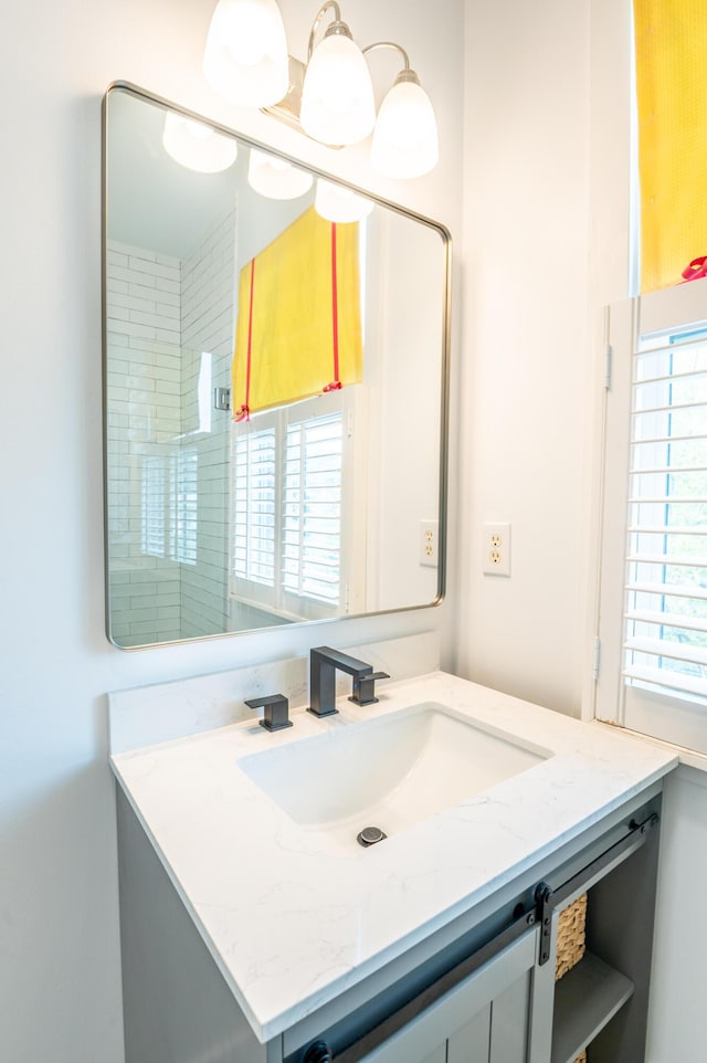 173 Coming St Unit B, Charleston, SC 29403 - bathroom with vanity and healthy amount of natural light