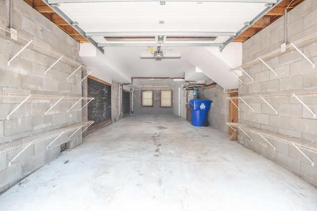 173 Coming St Unit B, Charleston, SC 29403 - garage featuring water heater and concrete block wall