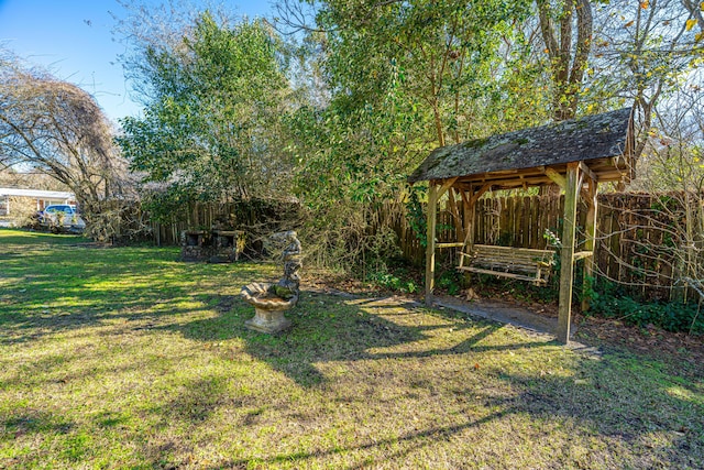 view of yard with fence