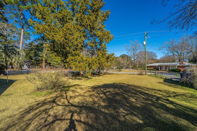 view of yard featuring fence