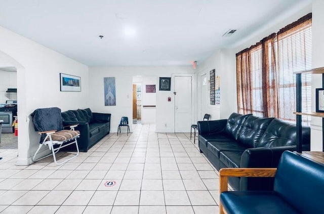 living room featuring light tile patterned flooring