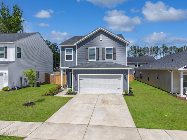 traditional-style house featuring central AC unit, an attached garage, concrete driveway, and a front lawn