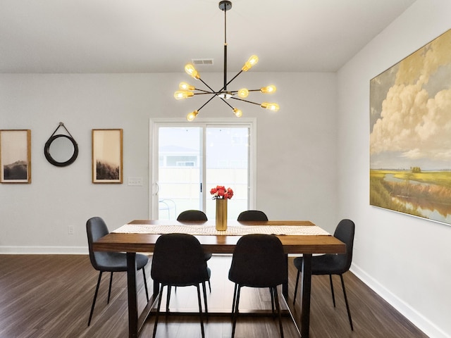 dining space featuring baseboards, visible vents, a chandelier, and dark wood-style floors