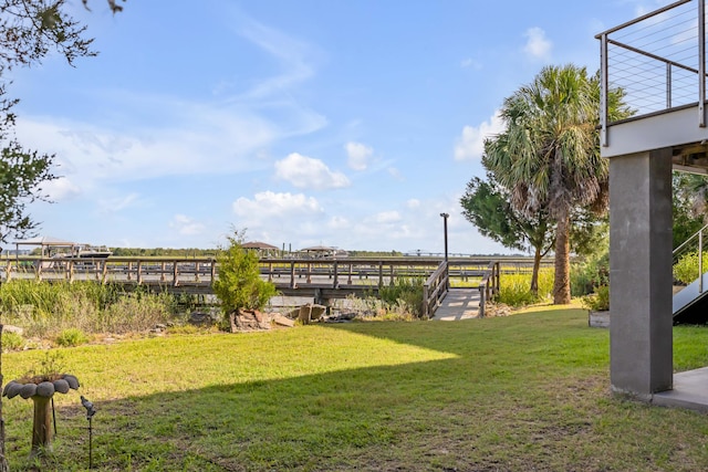 view of yard with a rural view