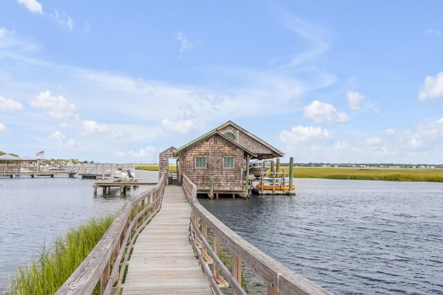 dock area with a water view