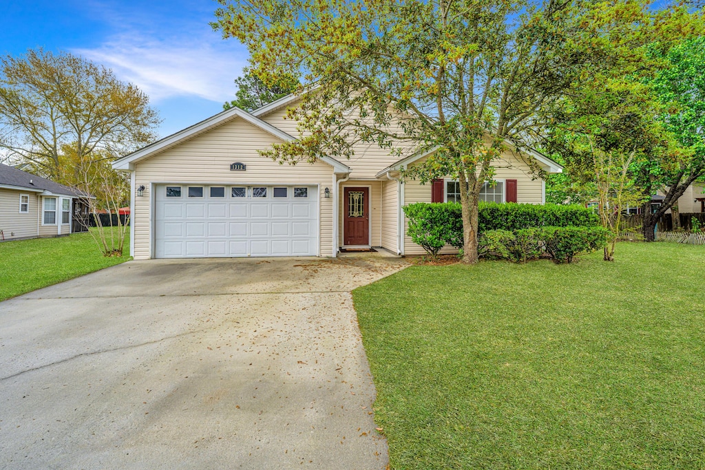 1312 Belle Grove Cir, Hanahan, SC 29410 - view of front of property with a front yard, an attached garage, and concrete driveway