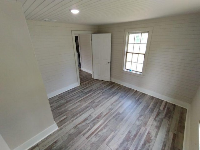 unfurnished room featuring wood-type flooring