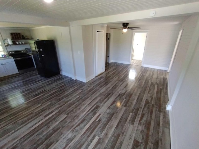 interior space featuring ceiling fan and dark wood-type flooring