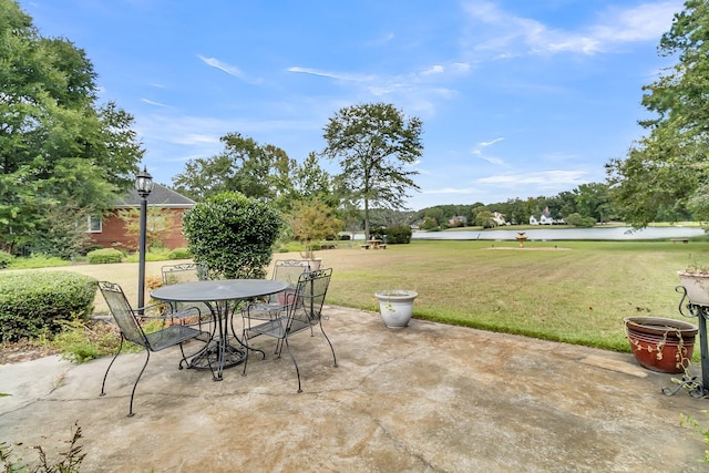 view of patio / terrace with a water view