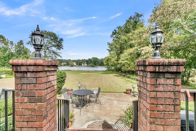 view of patio / terrace with a water view