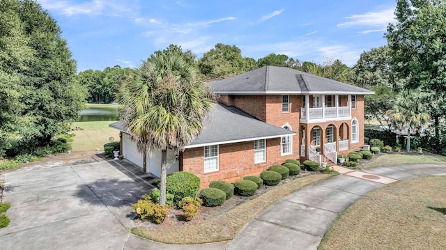 view of property exterior featuring a water view