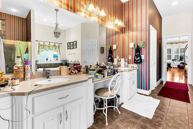 bathroom with vanity and tile patterned flooring