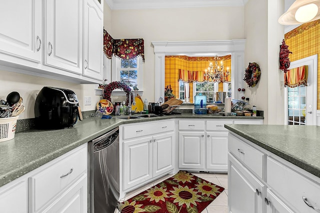 kitchen with crown molding, a sink, a chandelier, dishwasher, and light tile patterned floors