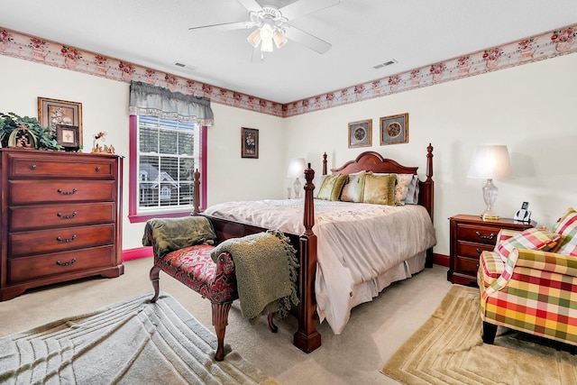 bedroom featuring ceiling fan and light colored carpet