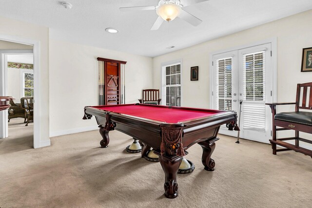 rec room featuring billiards, baseboards, light colored carpet, visible vents, and ceiling fan