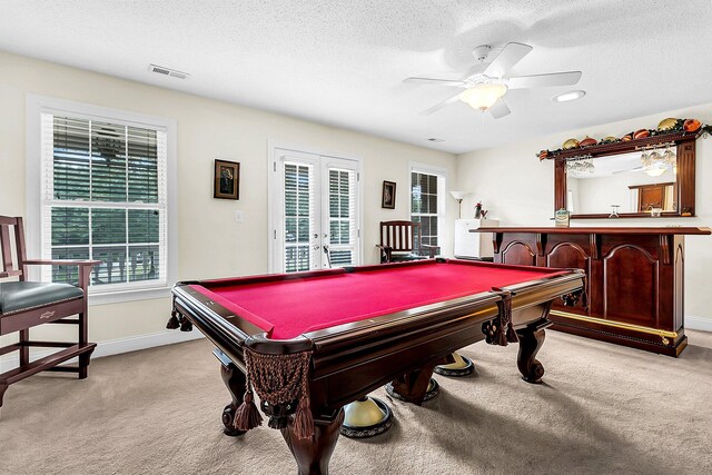 game room featuring light carpet, pool table, french doors, and a healthy amount of sunlight