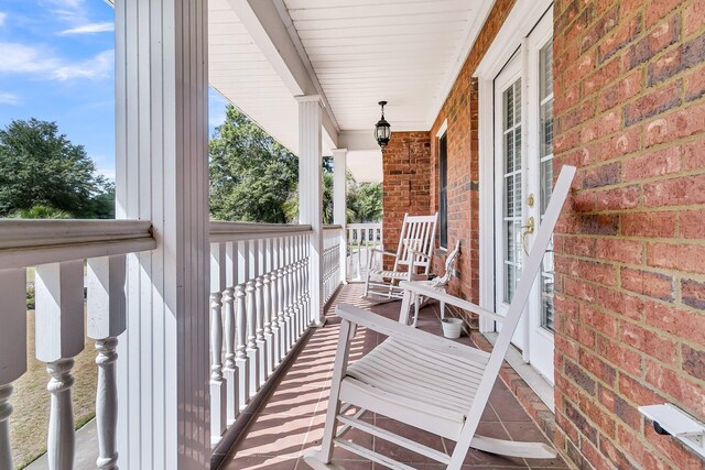 balcony featuring a porch