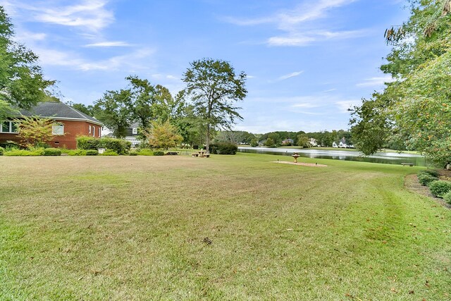 view of yard featuring a water view