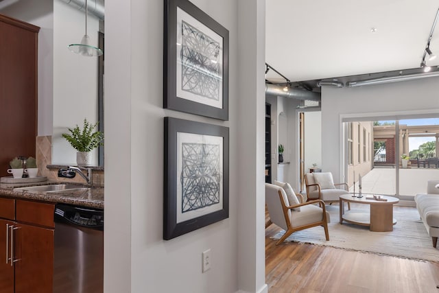 150 Bee St Unit 308, Charleston, SC 29401 - living room with track lighting and light wood finished floors