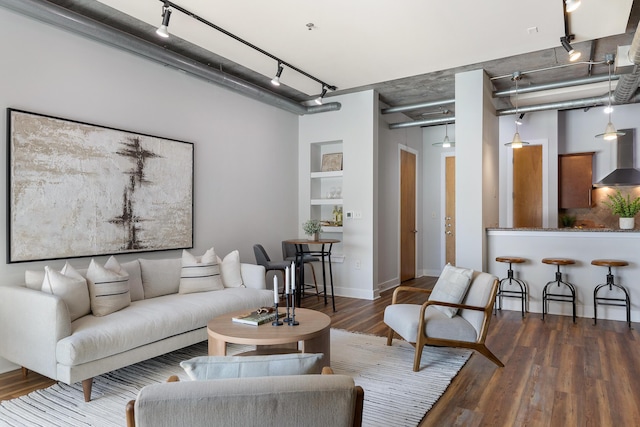 150 Bee St Unit 308, Charleston, SC 29401 - living area with track lighting and wood finished floors
