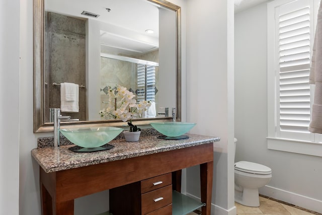 150 Bee St Unit 308, Charleston, SC 29401 - full bath featuring double vanity and a shower with shower door