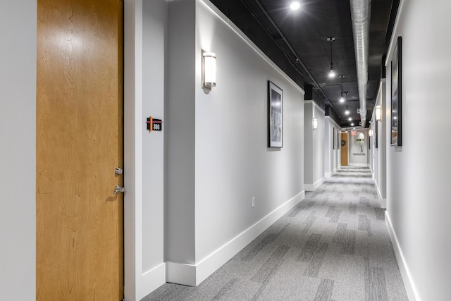 150 Bee St Unit 308, Charleston, SC 29401 - hallway featuring carpet flooring and baseboards