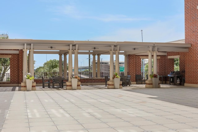 150 Bee St Unit 308, Charleston, SC 29401 - view of patio featuring a grill