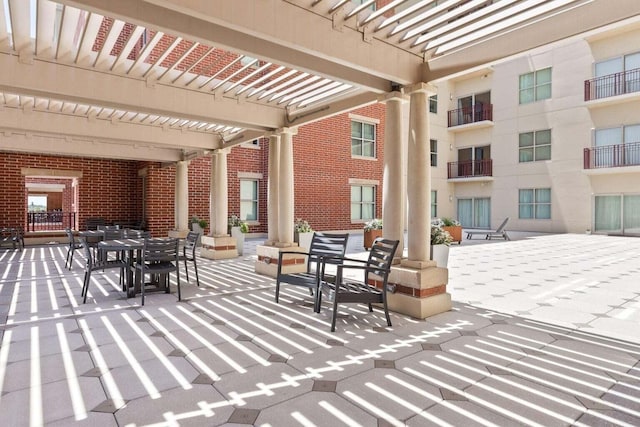 150 Bee St Unit 308, Charleston, SC 29401 - view of patio / terrace featuring a pergola