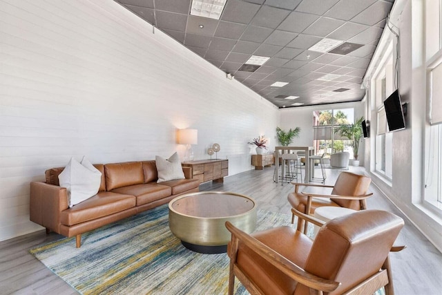 150 Bee St Unit 308, Charleston, SC 29401 - living room with wood finished floors and a drop ceiling