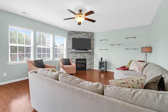9785 Black Willow Ln, Ladson, SC 29456 - living room featuring a ceiling fan, baseboards, wood finished floors, and a fireplace