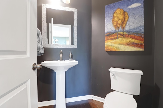 9785 Black Willow Ln, Ladson, SC 29456 - half bath with baseboards, toilet, and wood finished floors