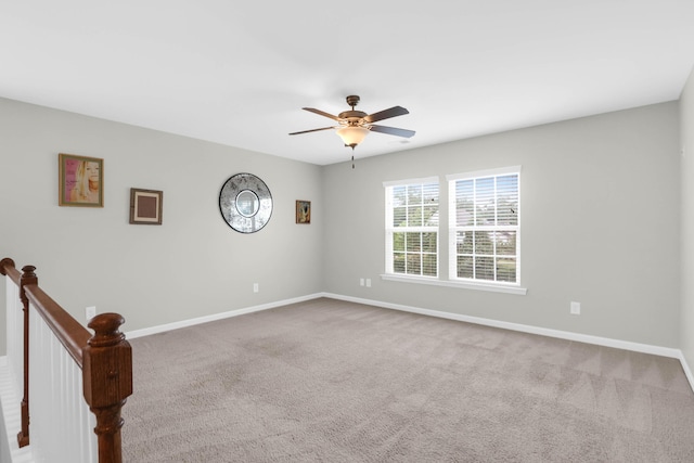 9785 Black Willow Ln, Ladson, SC 29456 - spare room featuring baseboards, ceiling fan, and carpet