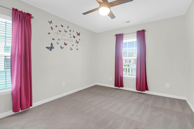 9785 Black Willow Ln, Ladson, SC 29456 - carpeted spare room with a ceiling fan and baseboards